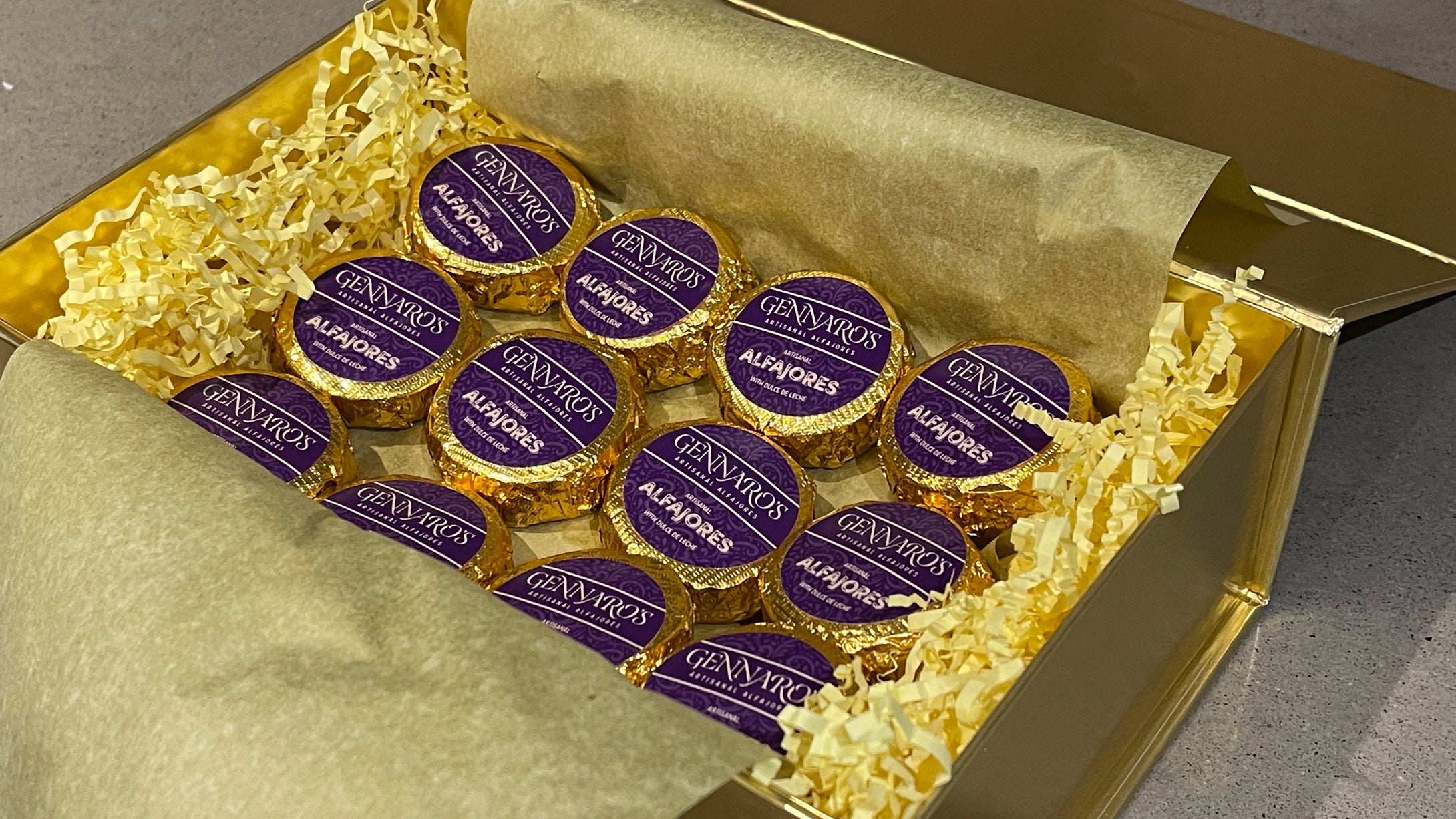 Gennaro’s Signature Alfajores Wrapped in Gold Foil